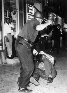 police beating man
